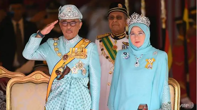 malaysias king and queen go into coronavirus quarantine after palace staff test positive